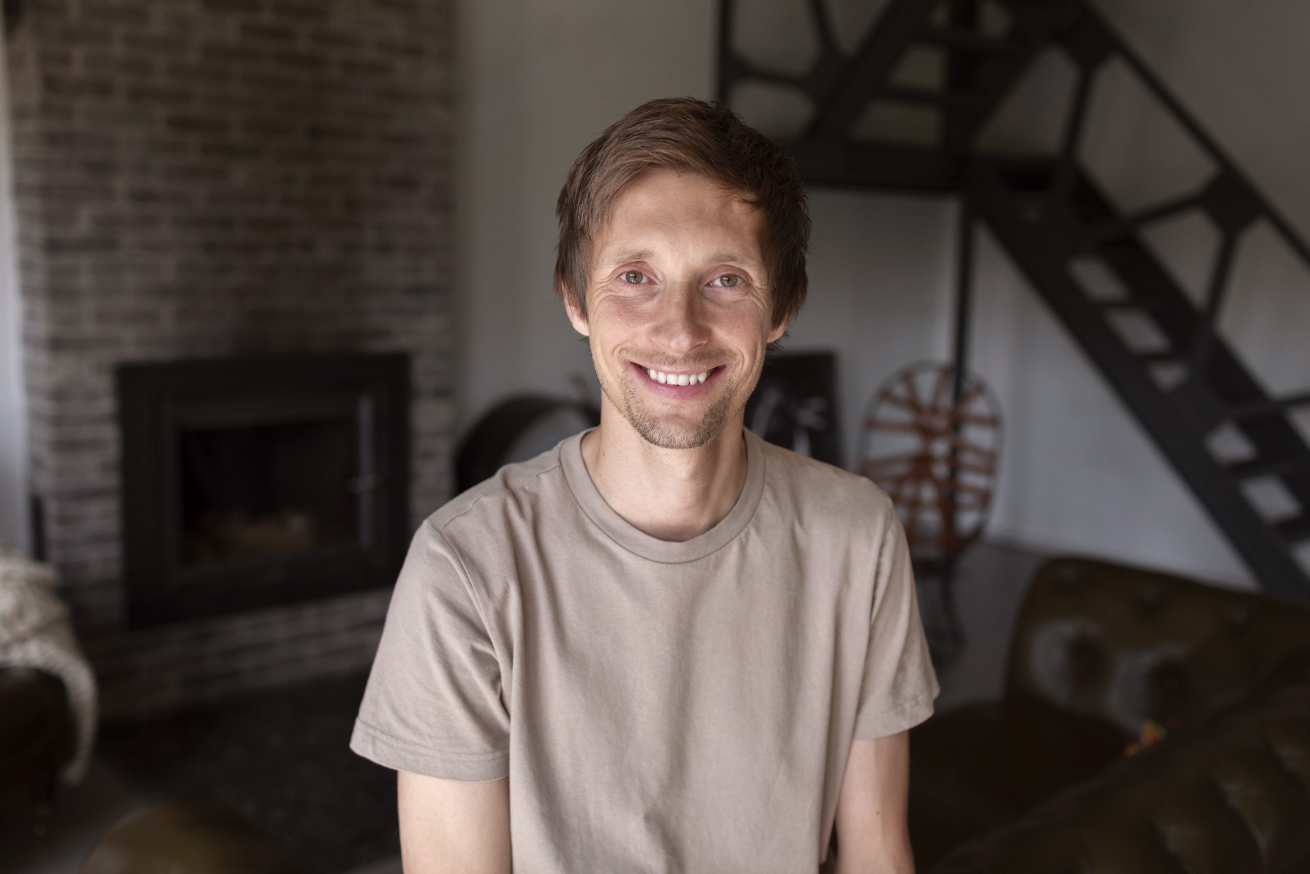Man at home smiling
